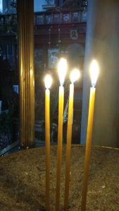 Lit candles in a chapel in Lesvos, Grèce