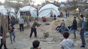 Refugees playing ball in Moria camp in Lesvos, Greece