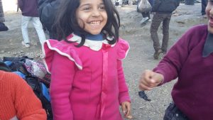 Refugee kid smiling in Lesvos, Greece