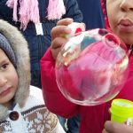 Kids playing bubbles at Moria camp in Lesvos, Greece