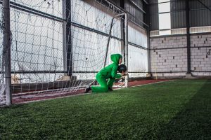 Syrian refugee girl playing football